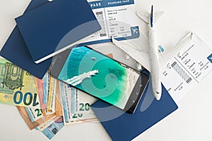 Airline tickets and documents on white background