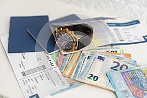 Airline tickets and documents on white background