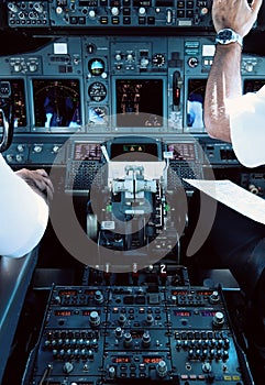 Airliner Cockpit with Pilots