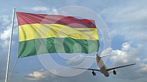 Airliner flying over waving flag of Bolivia. 3D animation