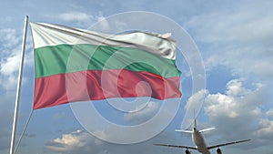 Airliner flying over waving flag of Bulgaria. 3D rendering