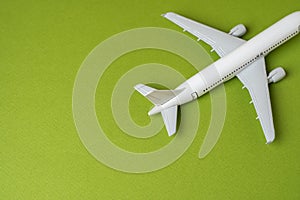 Airlines plane on a green background. Planning your trips.