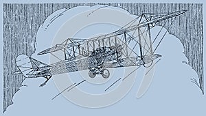 Airman waving from a historic two-seater biplane, flying towards a large cumulus cloud in a blue-grey sky