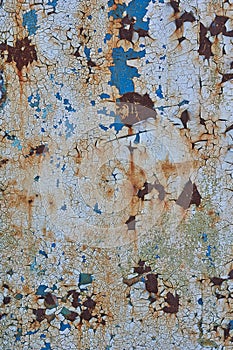 The airon panel with several layers of paint cracked.