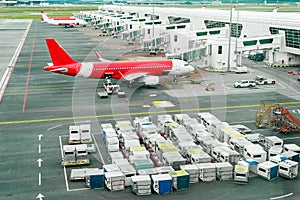 Airplains and freight containers in airport