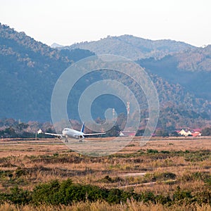 The airplane against the background of the Laotian landscape in