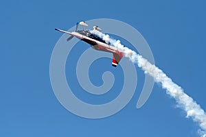 Airplane in airshow maneuvers