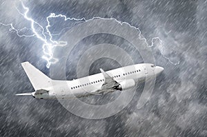Airplane approach at the airport landing in bad weather storm hurricane rain llightning strike