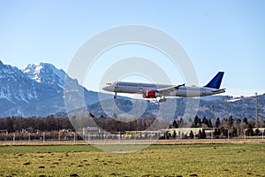 Airplane arrival at the airport. Travel by air, transportation photo