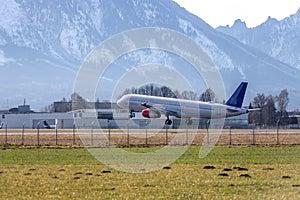 Airplane arrival at the airport. Travel by air, transportation photo