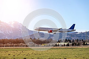 Airplane arrival at the airport. Travel by air, transportation photo