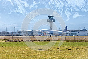 Airplane arrival at the airport. Travel by air, transportation photo
