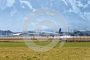 Airplane arrival at the airport. Travel by air, transportation photo