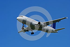 Airplane on blue sky