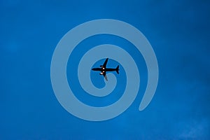 Airplane in blue sky background