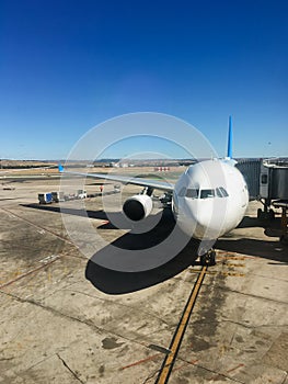 Airplane with boarding gangway before take off