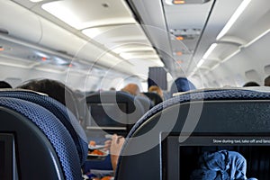 Airplane cabin interior passengers