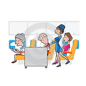 Airplane cabin passengers and air hostess and cart