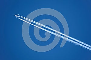 Airplane with contrail