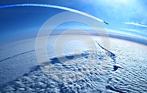 Airplane contrails in the blue sky