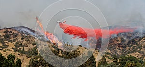 Airplane Dropping Fire Retardant on a Wildfire