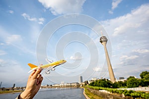 Airplane on the Dusseldorf city background