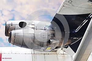 Airplane engine with blue sky .under aircraft wing view