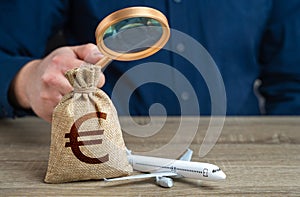 Airplane and euro money bag under investigation.