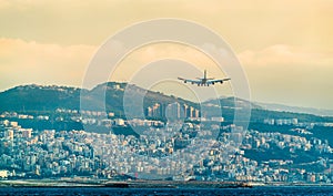 Airplane on final approach to Beirut International Airport, Lebanon photo