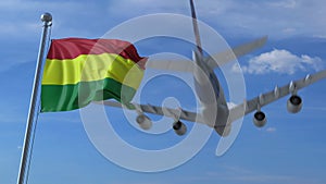 Airplane flies over waving flag of Bolivia. 3D rendering