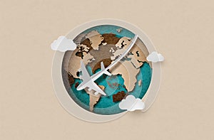 Airplane fly around the planet concept of travel.