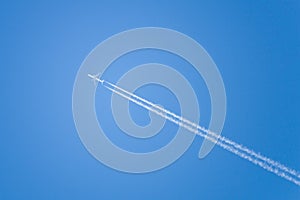 Airplane fly at blue sky