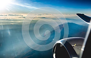 Airplane flying above the clouds