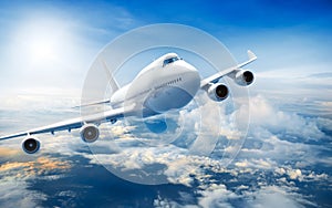 Airplane flying above clouds