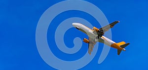 airplane flying on blue sky