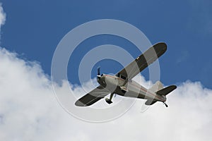 Airplane Flying through the Clouds
