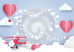 Airplane flying over clouds and smoke hearts shape background