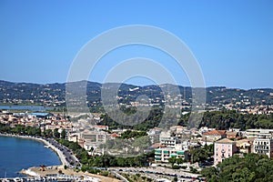 Airplane flying over Corfu town