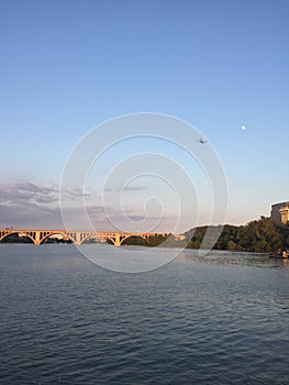 Airplane flying over the potomac river