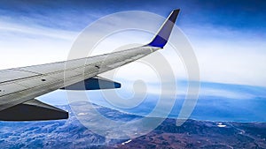 Airplane flying over the Sea of Cortez and the Pacific Ocean, in the Mexican state of Baja California.