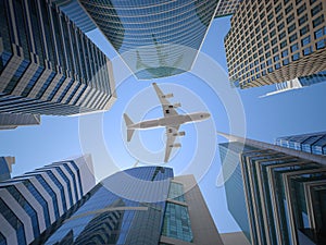 Airplane flying over skyscrapers n city downtown district. Business corporate travel background concept. 3