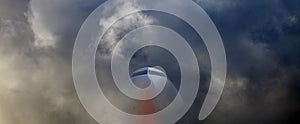 Airplane flying through storm