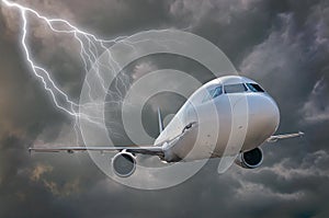 Airplane is flying in storm. Dark clouds and lightning in background