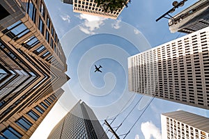 Airplane flying on top of Skycrapers in Midtown Atlanta