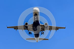 Airplane flying under the sky.