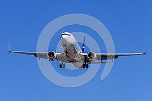 Airplane flying under the sky.