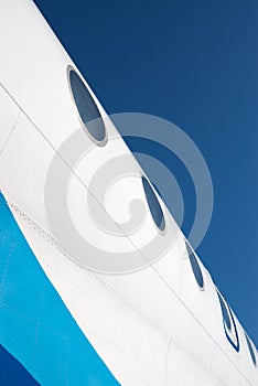 Airplane fuselage with illuminators photo