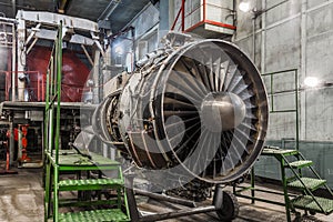 Airplane gas turbine engine detail in hangar