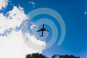 Airplane high speed on the clouds sky.