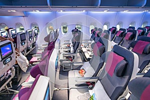 Airplane interior with empty seats